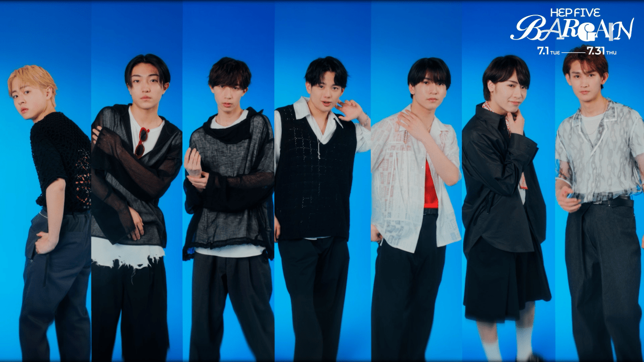 Seven young men posing together against a blue background, showcasing trendy summer fashion as part of the HEP FIVE BARGAIN campaign.
