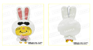 A plush toy of 'Nekomasu' designed by Takahisa Masuda, featuring a rabbit character wearing a costume with the text 'USA'. The toy has a playful expression and is showcased from two angles.