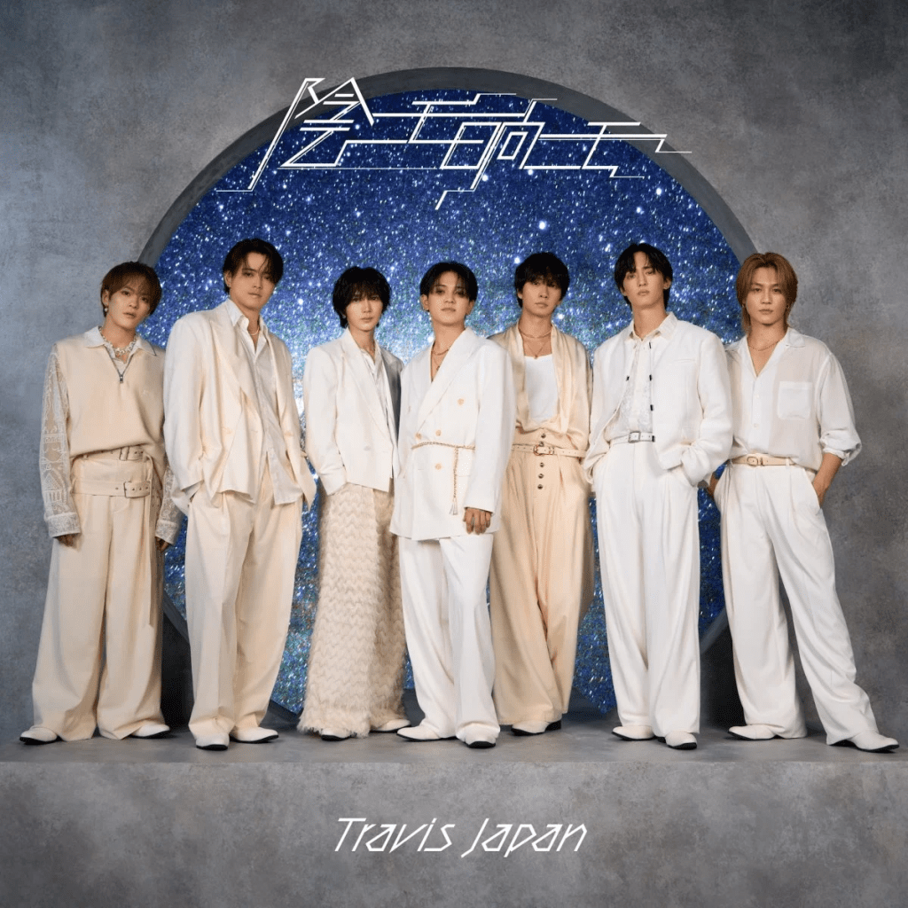 A group of seven men dressed in stylish white outfits, standing together against a starry background. The group is posed confidently, showcasing their fashion and coordinated style.