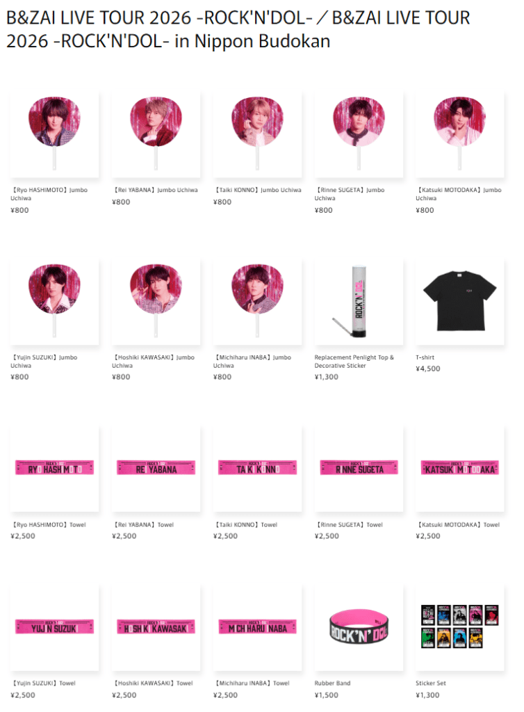 Merchandise for B&ZAI LIVE TOUR 2026 -ROCK'N'DOL- in Nippon Budokan, featuring jumbo uchiwa fans with artist images, towels with names, a T-shirt, rubber band, and sticker set.