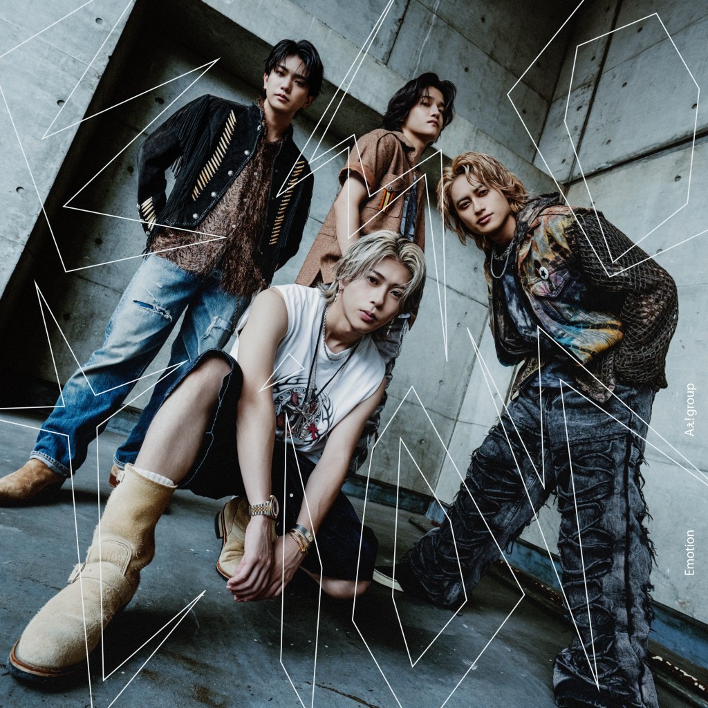 A four-member music group posing in a stylized indoor setting with a concrete wall background. The members showcase a mix of fashion styles, including casual and edgy clothing, with one member crouching in front and others standing behind.